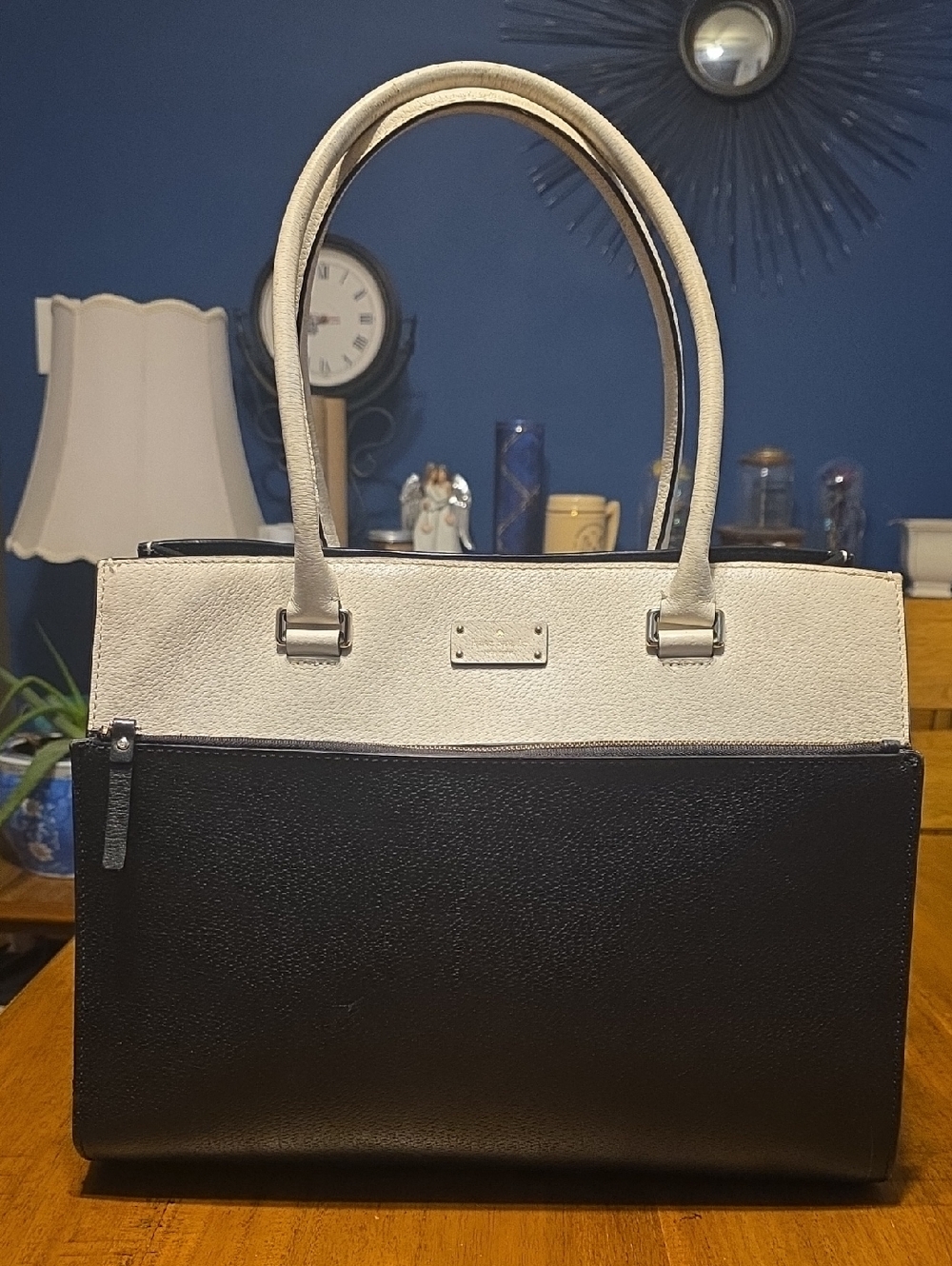 Kate Spade Grove Street Maeve leather tote bag in black and white.